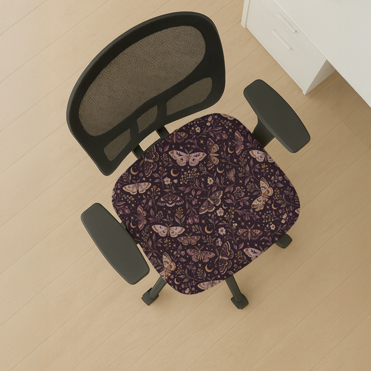 Twilight Moths seat-only cover; mesh back and both armrests remain bare.