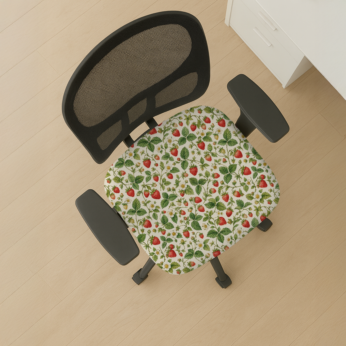 Wild Strawberry Meadow seat-only cover on a mesh-back chair; mesh back and both armrests remain bare.